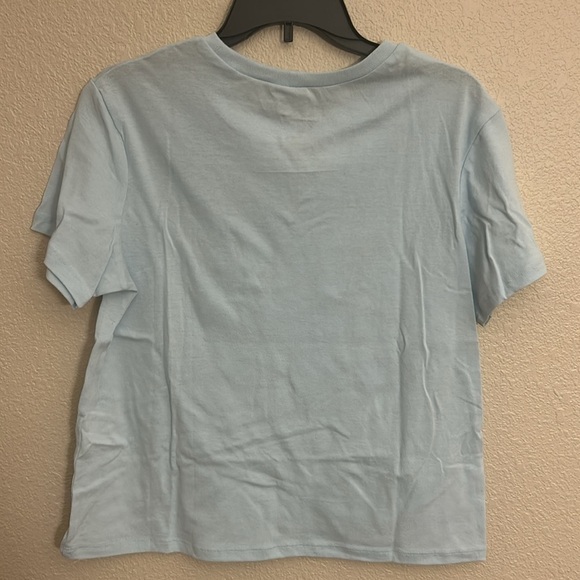 Women’s Disney shirt size medium in a light blue color. - Picture 3 of 4